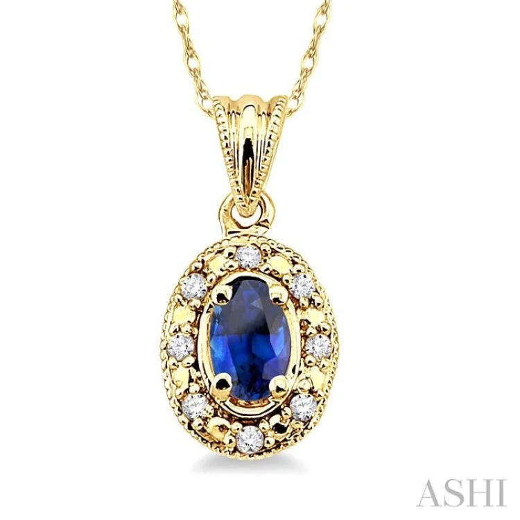 5x3mm Oval Shape Sapphire and 1/20 Ctw Single Cut Diamond Pendant in 10K Yellow Gold with Chain