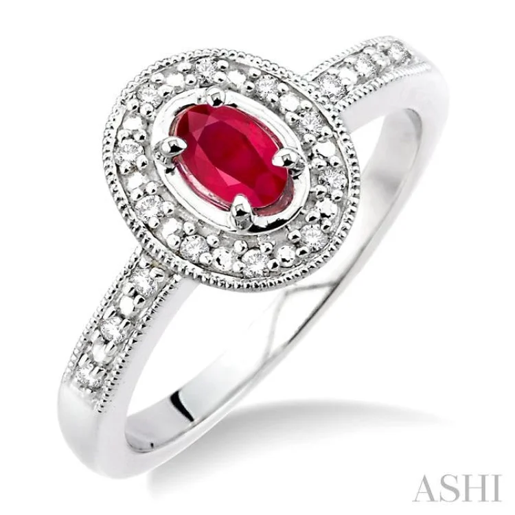 5x3mm Oval Cut Ruby and 1/10 Ctw Single Cut Diamond Ring in 10K White Gold.